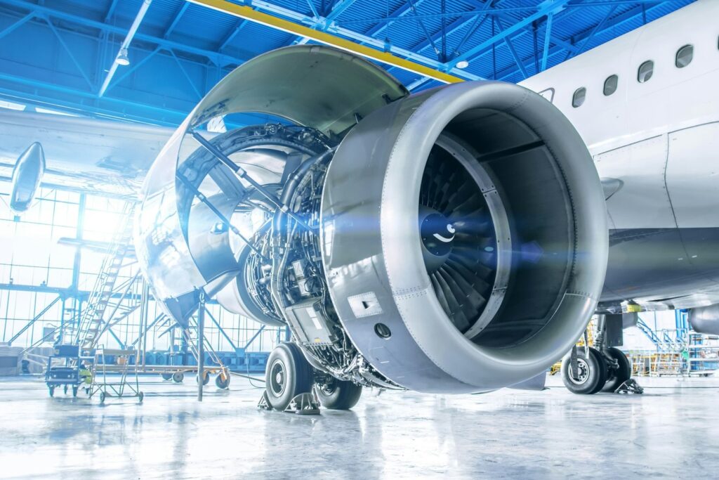 Aircraft jet engine under maintenance in a hangar